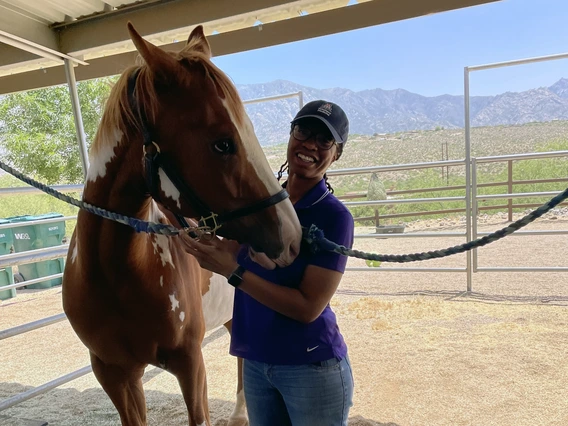 Domo Williams with a horse 